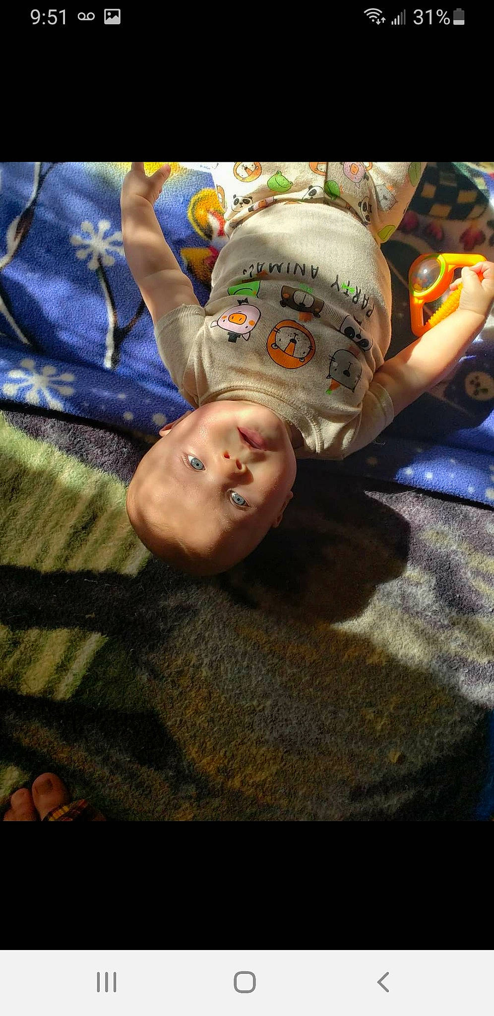 Ethan Jr is registered to the contest to win money with this photo: baby_toddler_clothing, child, comfort, flooring, fun, grass, happy, linens, pattern, person, room, sitting, smile, toddler