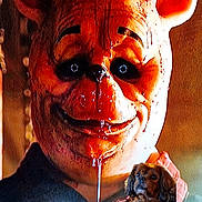 Winnie L'Ourson a rejoint le concours — aidez-le/la à gagner de superbes lots ! bear_mask, dripping_liquid, person, dog, brown_dog, indoor, creepy, scary, portrait, animal, costume, face_mask, dark_background, close_up, fur, pet, canine, expressionless, contrast, lighting