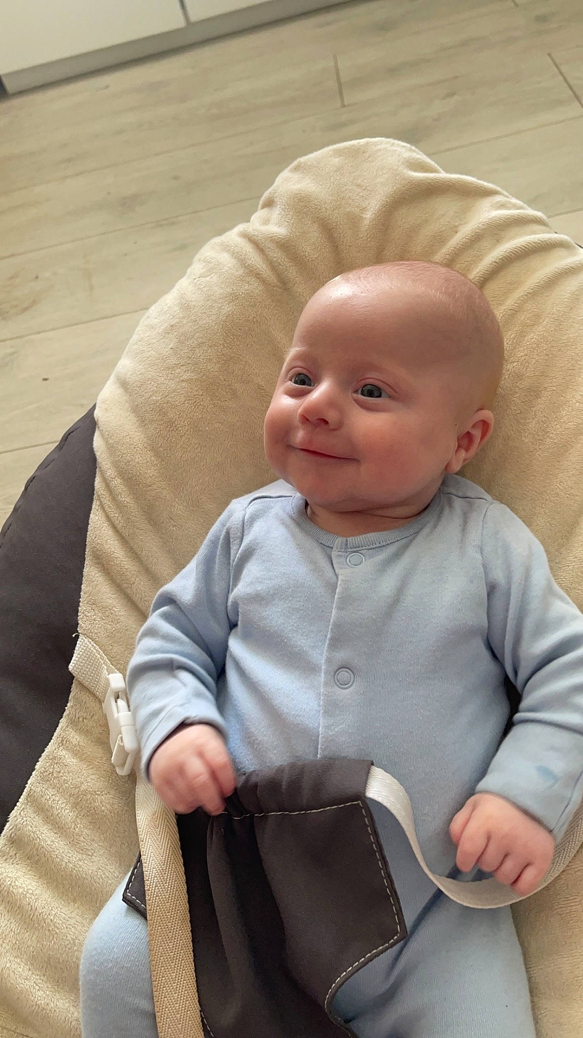 Brody is registered to the contest to win money with this photo: baby, baby_products, baby_toddler_clothing, cheek, child, chin, comfort, eye, eyebrow, face, happy, head, iris, nose, outerwear, person, sitting, skin, sleeve, smile