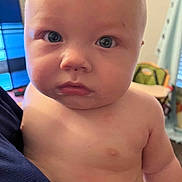 Amirion is registered to the contest to win money with this photo: baby, background, blue_eyes, candid, child, chubby, close_up, curious, cute, expression, face, head, human, indoor, looking, newborn, person, portrait, skin, soft_light