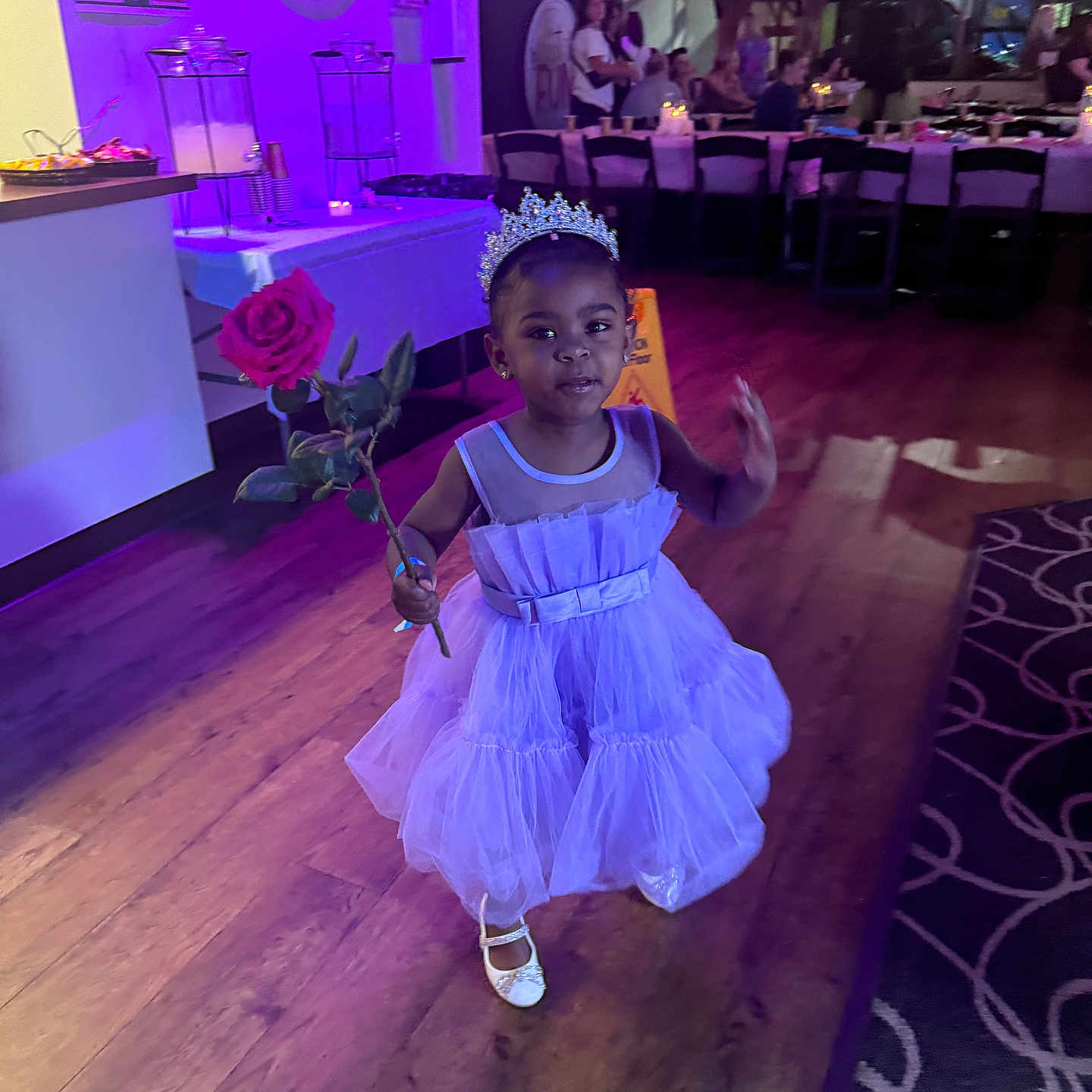 Kelsey joined the competition — help win amazing prizes! accessories, child, clothing, dancing, dress, female, flower, flowerarrangement, flowerbouquet, formalwear, girl, hardwood, indoors, interiordesign, jewelry, person, plant, purple, rose, wood