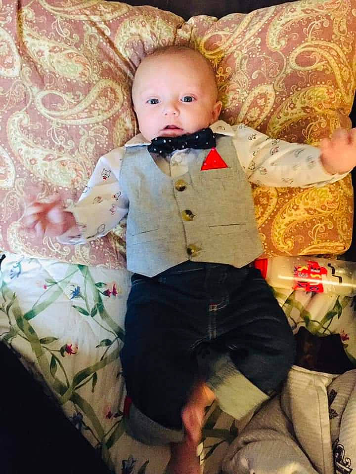 Malikai is registered to the contest to win money with this photo: baby, cheek, child, doll, person, sitting, toddler, toy