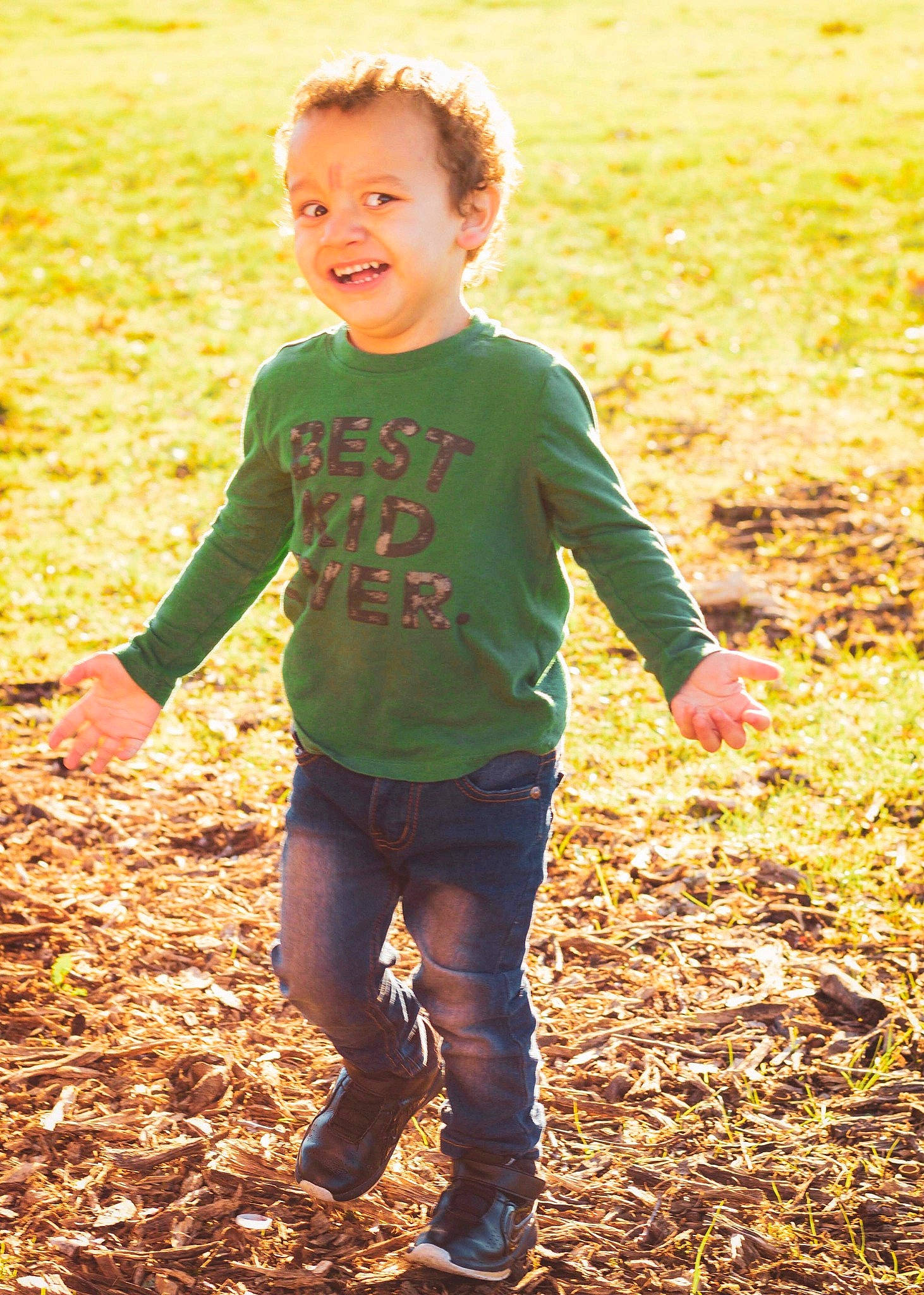 Logan joined the competition — help win amazing prizes! child, fun, green, happy, joy, people_in_nature, person, play, smile, soil, standing, summer, sunlight, t_shirt, toddler