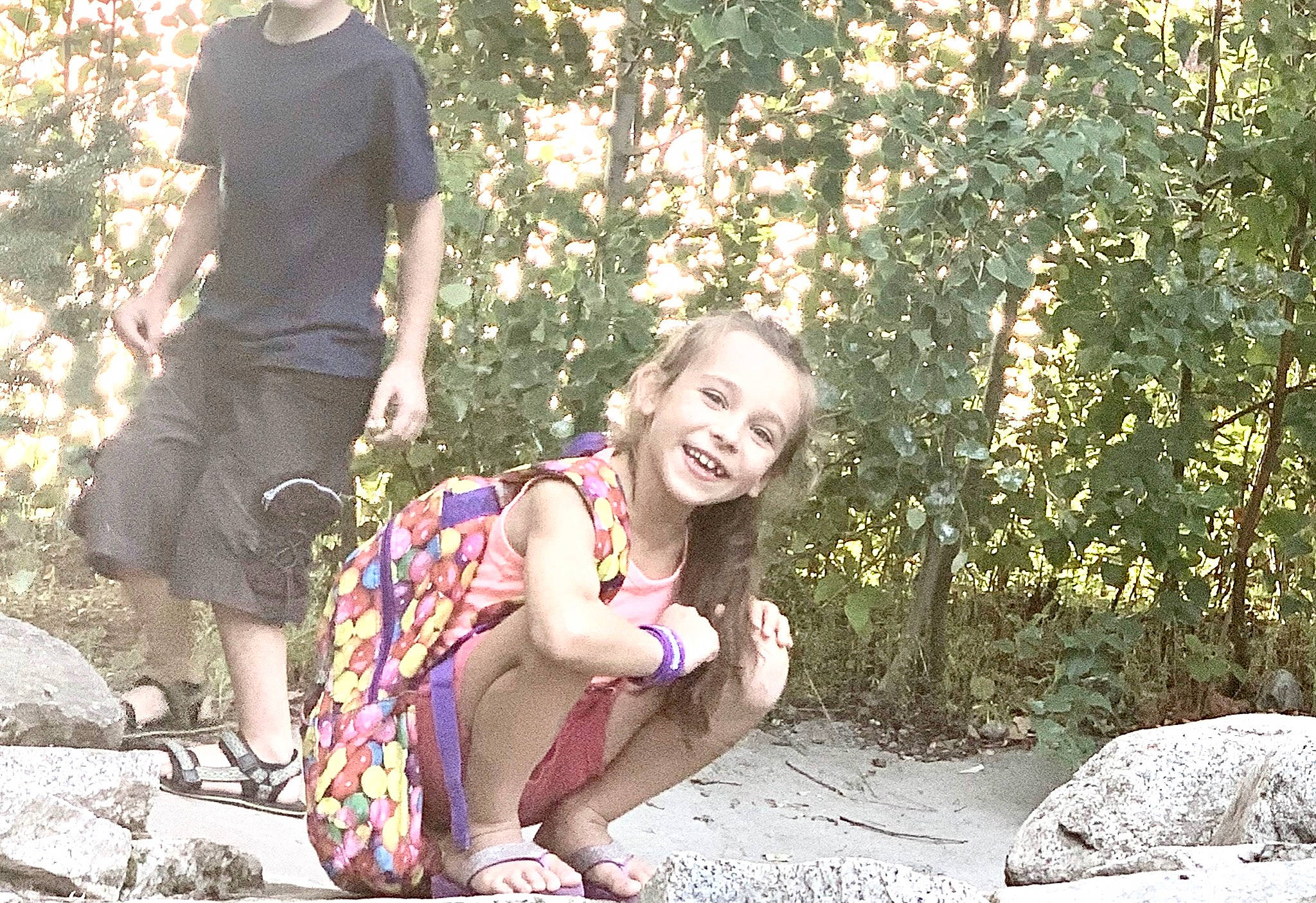 Daniella is registered to the contest to win money with this photo: child, family, fawn, happy, joy, leisure, people, people_in_nature, person, photograph, photography, plant, recreation, rock, sitting, smile, state_park, summer, sunlight, tree