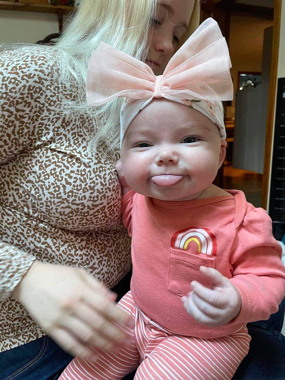 June joined the competition — help win amazing prizes! baby, baby_toddler_clothing, cap, cheek, child, comfort, event, face, fashion_accessory, fun, fur, gesture, happy, head, headgear, headwear, pattern, person, pink, skin