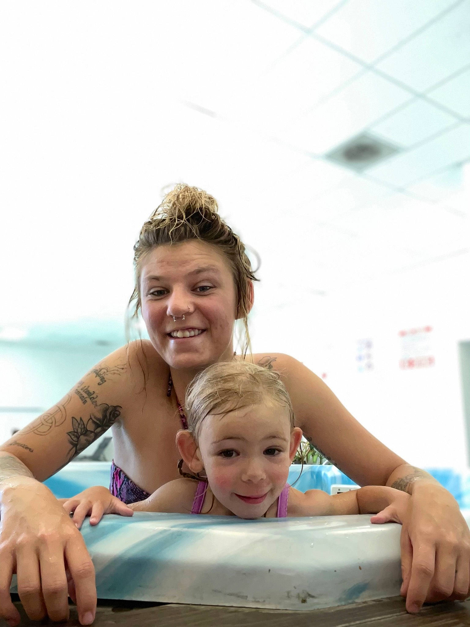 Cashleh Fallon is registered to the contest to win money with this photo: baby, blond, child, comfort, event, fun, hand, happy, joy, leisure, person, recreation, room, sitting, skin, sky, smile, swimming_pool, swimwear, toddler
