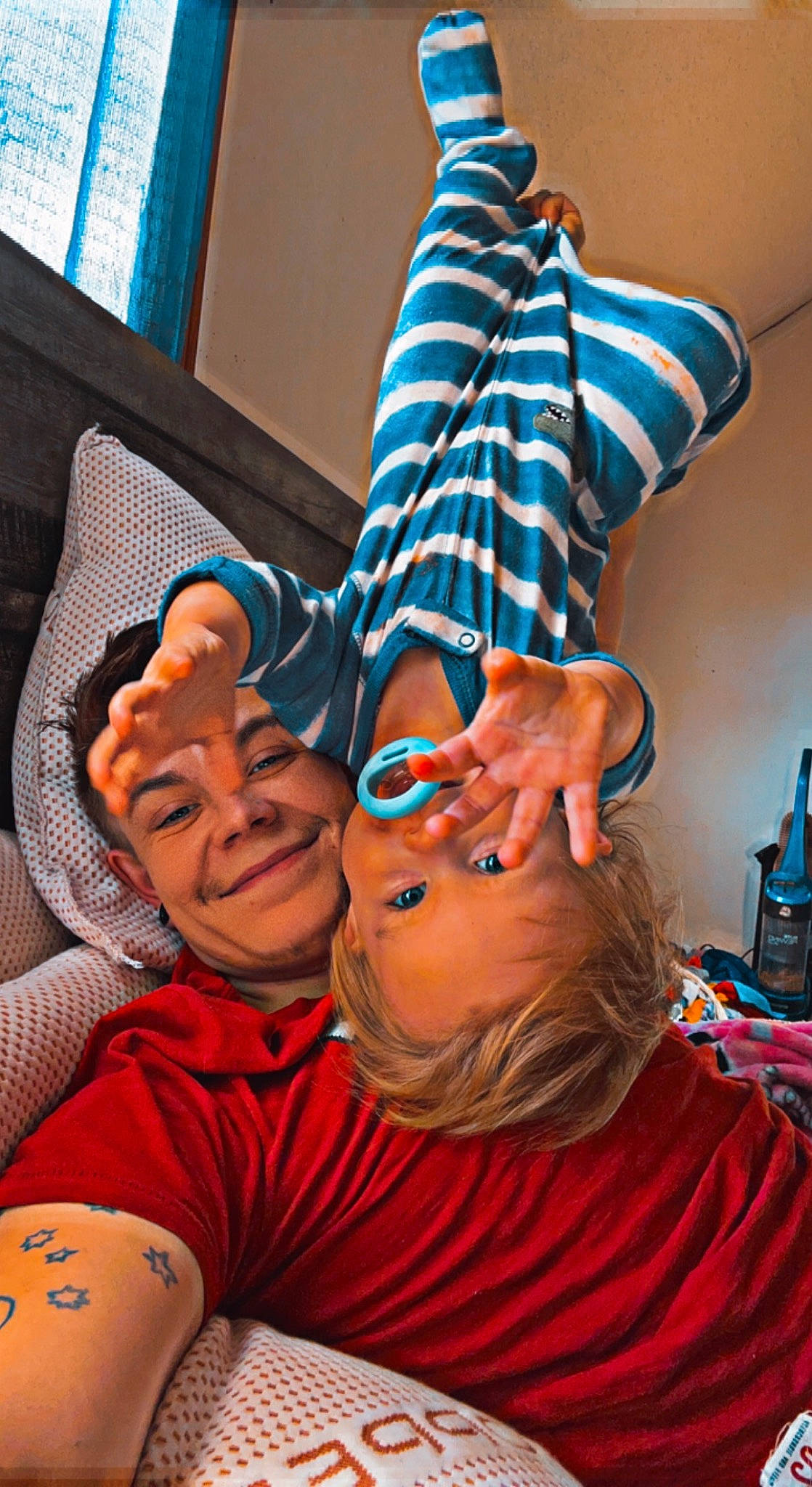 Nova-lynn joined the competition — help win amazing prizes! abdomen, blue, comfort, electric_blue, event, flooring, fun, gesture, happy, headwear, human_leg, joy, leisure, linens, orange, pattern, person, room, sitting, smile