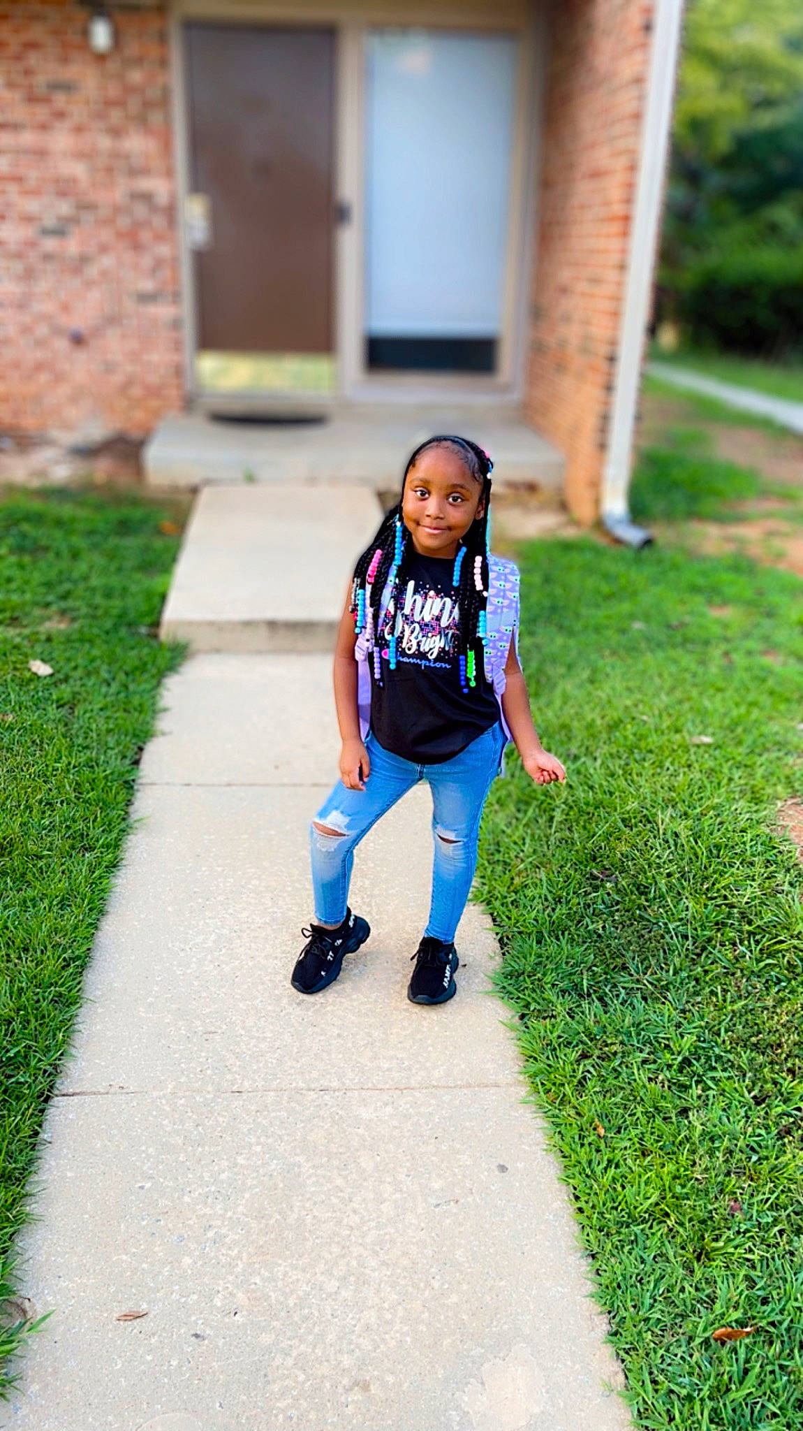 Kehlani joined the competition — help win amazing prizes! asphalt, brick, child, denim, electric_blue, fun, grass, happy, jeans, joy, leisure, person, portrait_photography, recreation, road, road_surface, sidewalk, sitting, smile, t_shirt