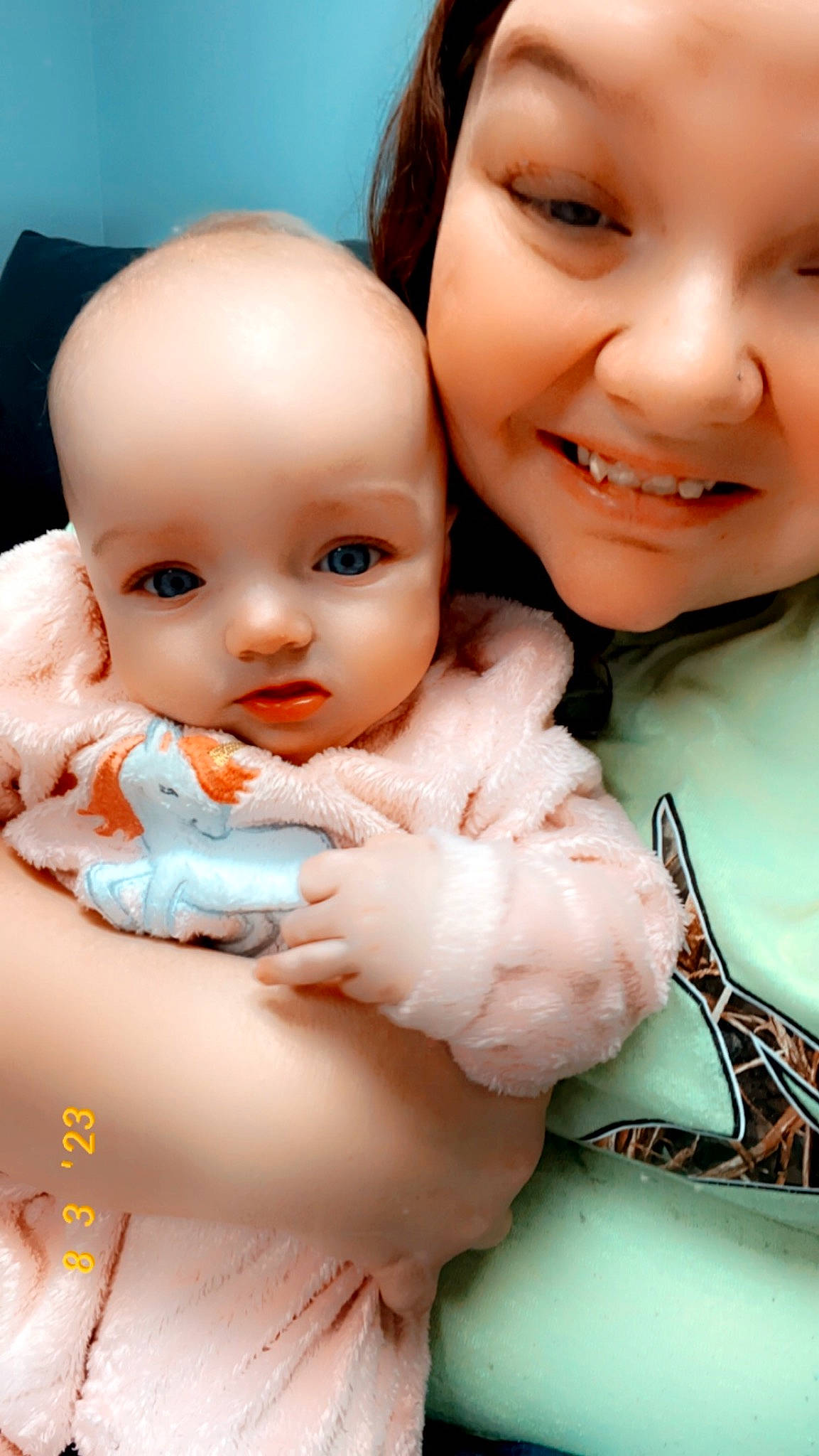 Ember is registered to the contest to win money with this photo: baby_toddler_clothing, cheek, chin, doll, eye, eyelash, facial_expression, finger, gesture, happy, headwear, iris, joy, lip, mouth, nose, person, pink, product, skin