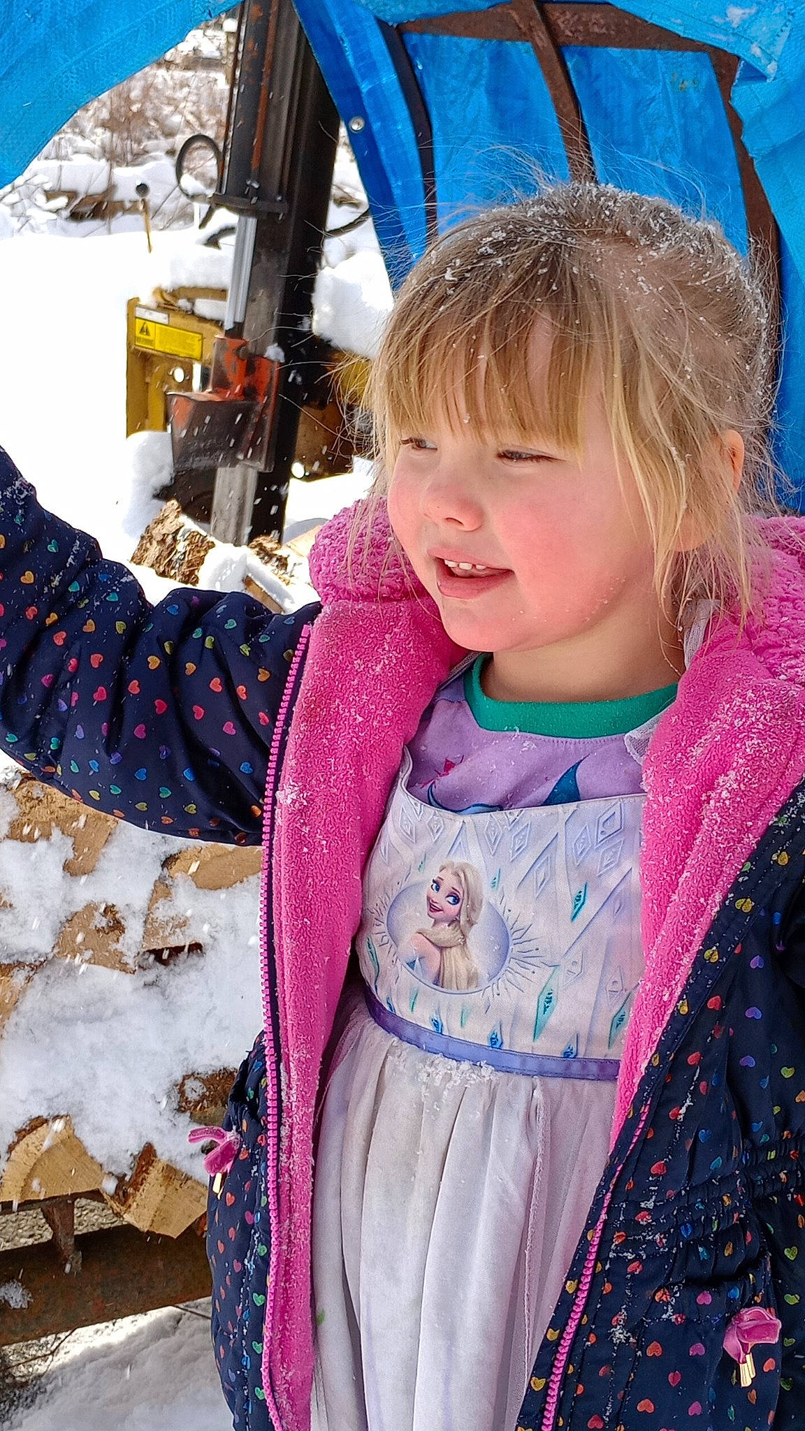 Charlee is registered to the contest to win money with this photo: baby_toddler_clothing, blue, child, event, fun, happy, jacket, leisure, person, photograph, pink, skin, sleeve, smile, snapshot, snow, textile, toddler, travel, white
