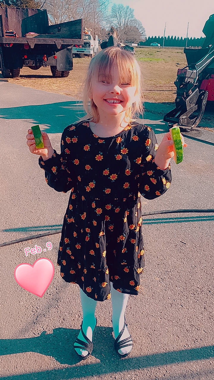 Charlee is registered to the contest to win money with this photo: black, eye, facial_expression, hair, hairstyle, hand, head, joint, joy, leg, organ, person, photograph, plant, product, shoe, shoulder, skin, smile, tire