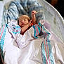 Slayton joined the competition — help win amazing prizes! newborn, baby, sleeping, blanket, bassinet, infant, cozy, peaceful, wrapped, hand, soft, striped, resting, cute, indoors, child, portrait, young, bed, comfort