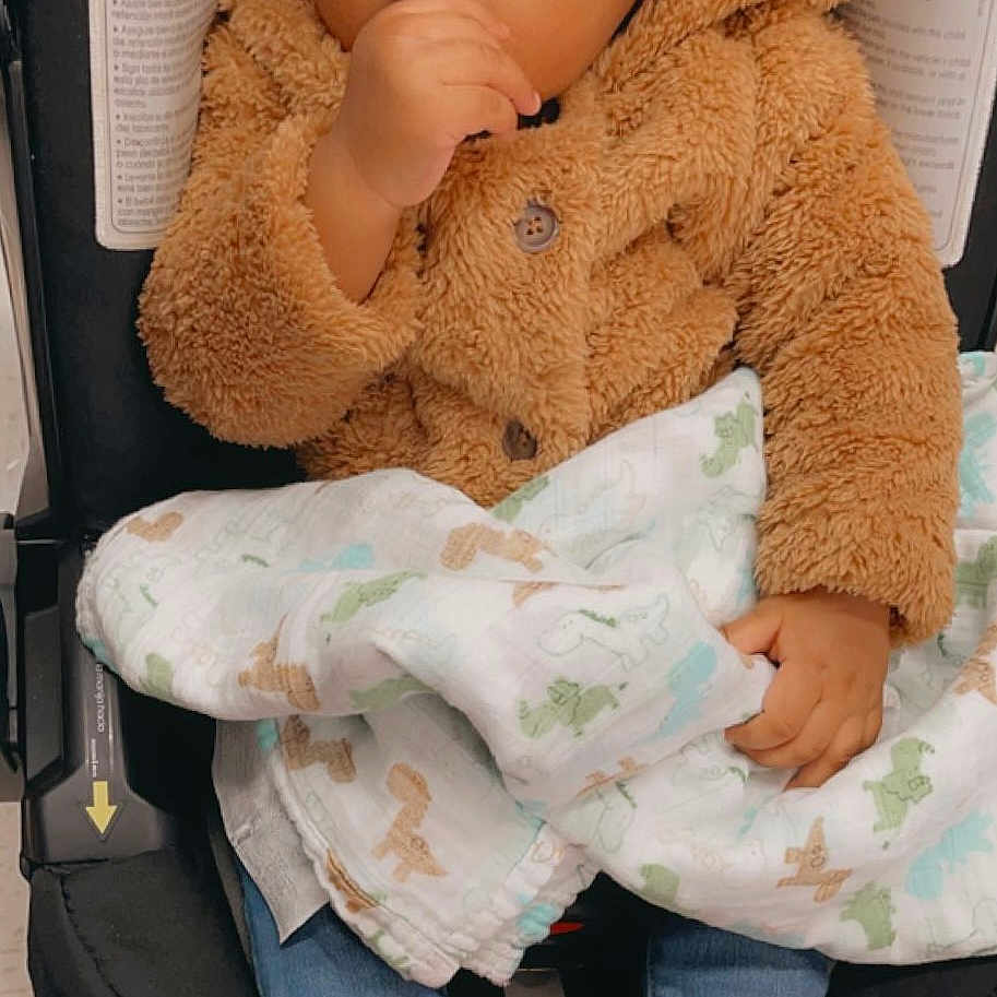 Kharter is registered to the contest to win money with this photo: baby, baby_toddler_clothing, cap, cheek, child, clothing, comfort, doll, eye, jeans, knit_cap, outerwear, sitting, skin, sleeve, textile, toy, white, wool, woolen