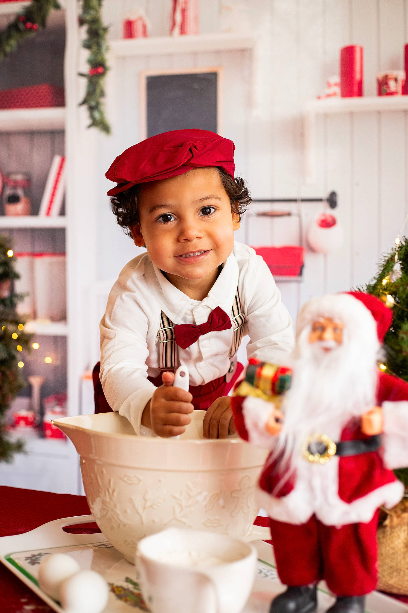 Elias joined the competition — help win amazing prizes! child, christmas, christmas_decoration, christmas_ornament, christmas_tree, cup, dishware, drinkware, event, happy, hat, headwear, holiday, joy, person, plate, porcelain, serveware, smile, table