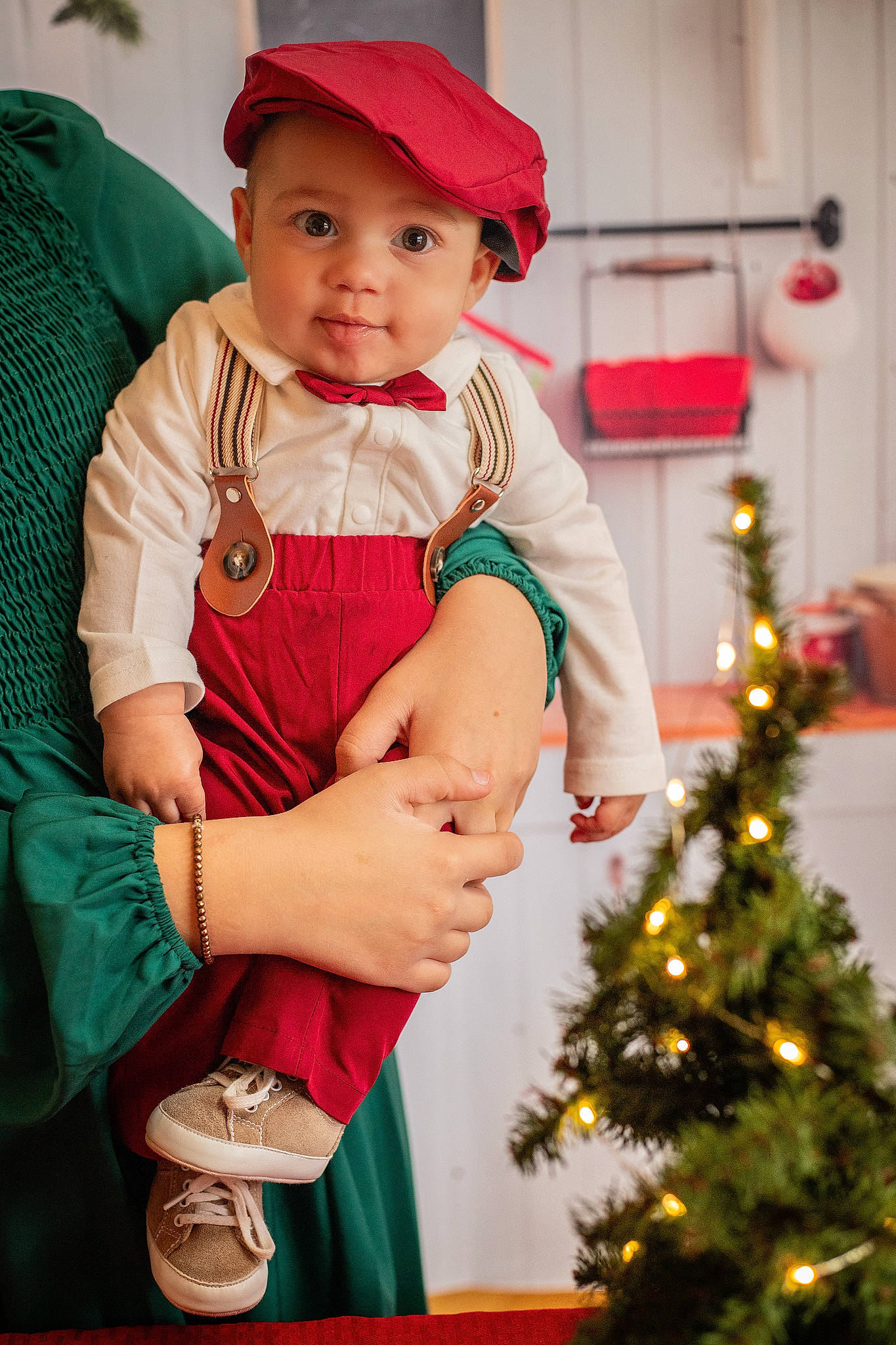 Easton joined the competition — help win amazing prizes! baby_toddler_clothing, baseball_cap, cap, christmas, christmas_decoration, christmas_ornament, christmas_tree, event, evergreen, hand, happy, headwear, holiday, holiday_ornament, ornament, person, plant, red, sleeve, toddler