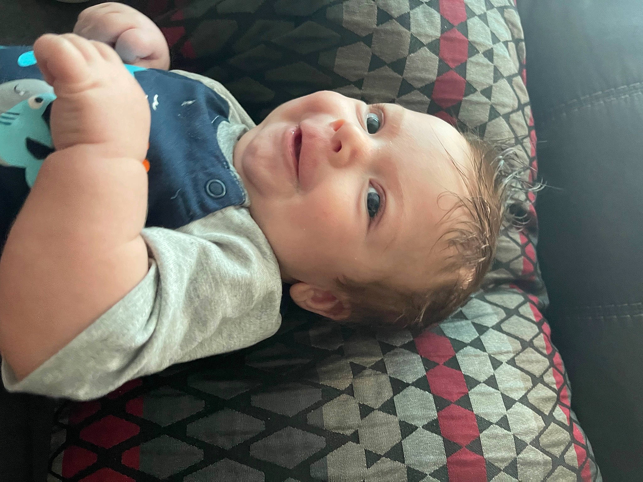 Waylon joined the competition — help win amazing prizes! baby, baby_products, baby_toddler_clothing, cheek, child, comfort, flash_photography, flooring, fun, gesture, happy, mouth, nose, pattern, person, room, sitting, skin, thumb, toddler