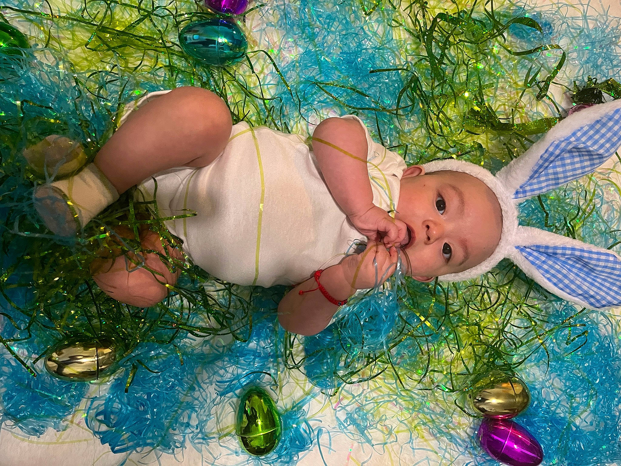 Jesus is registered to the contest to win money with this photo: abdomen, aqua, art, baby, chest, child, christmas_eve, christmas_ornament, fashion_accessory, fictional_character, fun, grass, happy, illustration, leisure, organism, paint, painting, people_in_nature, person