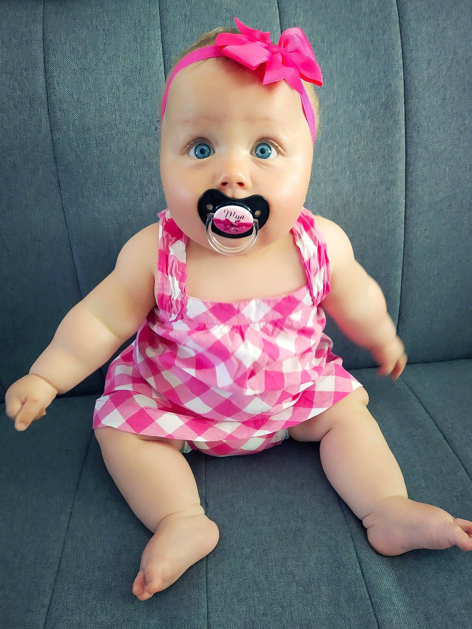 Mya a rejoint le concours — aidez-le/la à gagner de superbes lots ! baby, baby_laughing, baby_products, baby_toddler_clothing, cheek, child, head, headgear, lip, person, pink, skin, smile, toddler