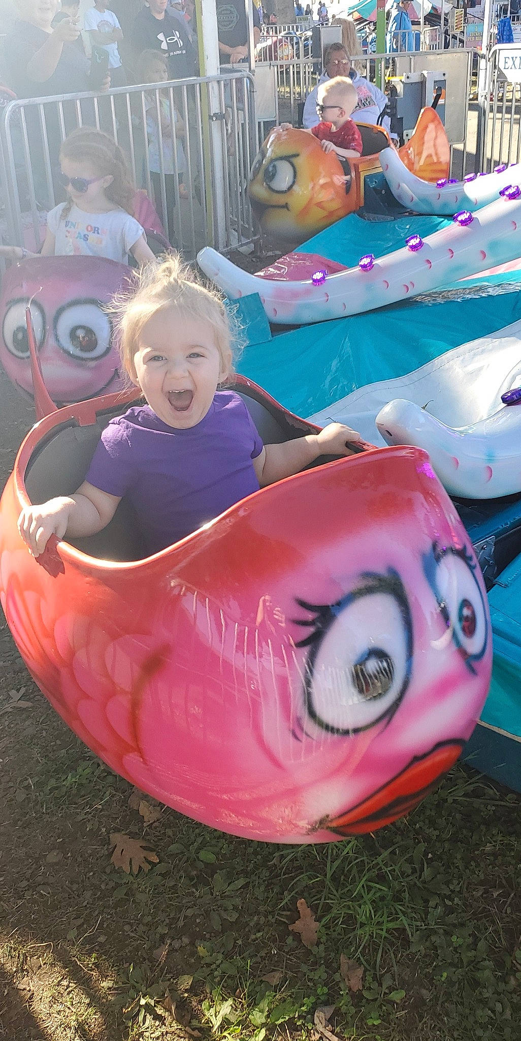 Paisley is registered to the contest to win money with this photo: amusement_ride, baby, baby_products, baby_toddler_clothing, boats_and_boating_equipment_and_supplies, fun, happy, inflatable, leisure, magenta, nonbuilding_structure, outdoor_recreation, person, pink, play, playground, recreation, smile, toddler, toy