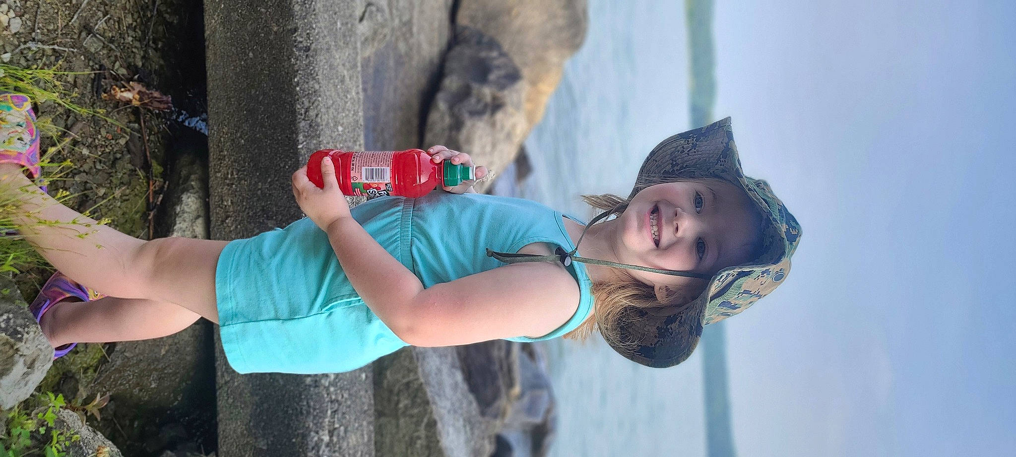 Paisley joined the competition — help win amazing prizes! adventure, arm, azure, child, elbow, electric_blue, fun, happy, hat, human_leg, joy, landscape, leisure, people_in_nature, person, recreation, sky, smile, t_shirt, travel