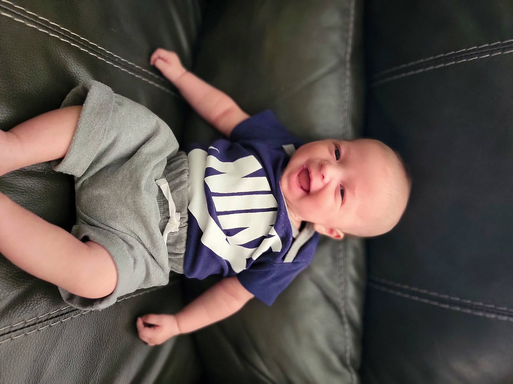 Jaxson is registered to the contest to win money with this photo: baby, baby_carriage, baby_products, baby_toddler_clothing, child, comfort, elbow, finger, flash_photography, fun, gesture, hat, human_body, knee, leg, person, sleeve, smile, thigh, toddler