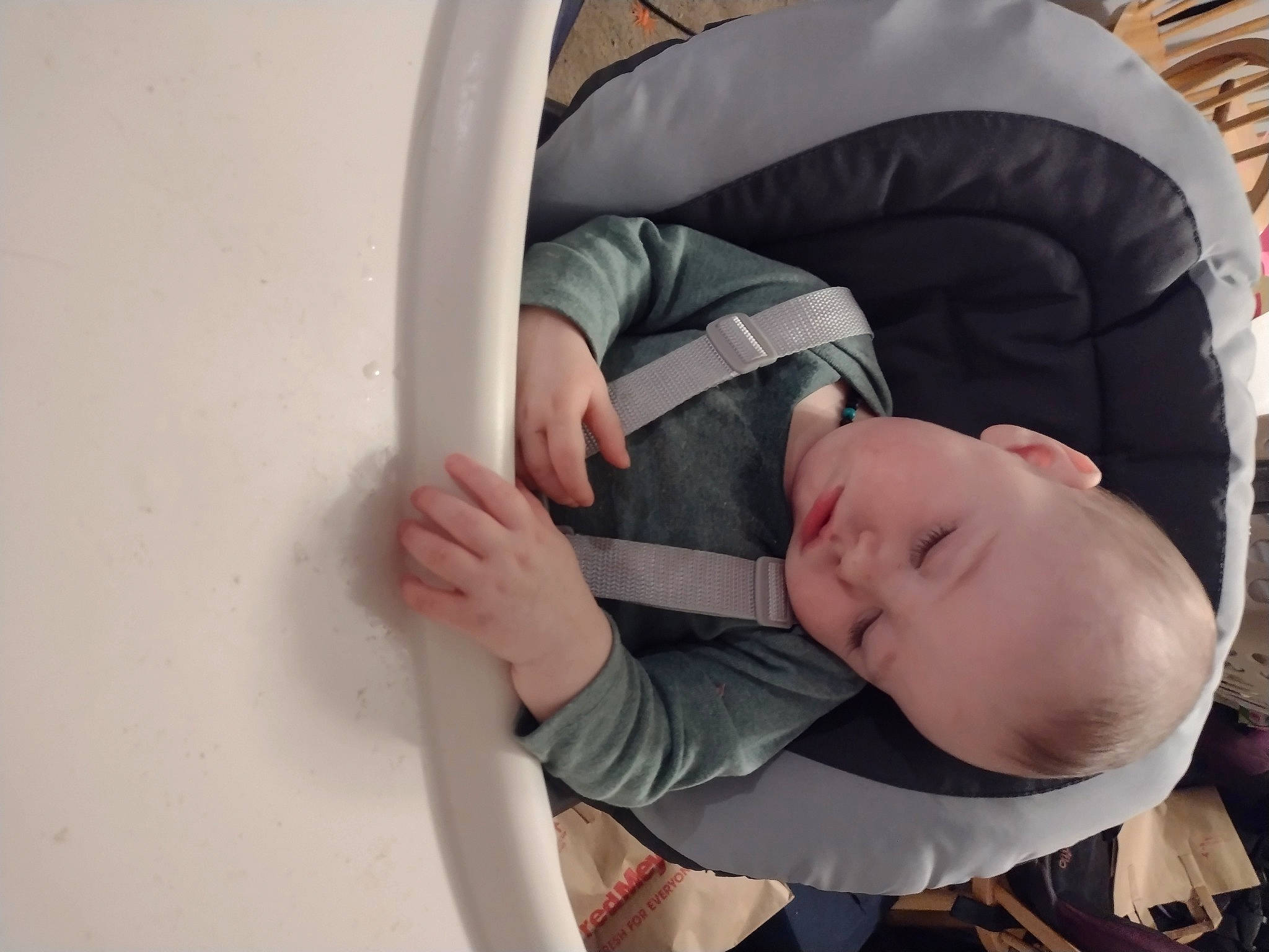 Draco is registered to the contest to win money with this photo: baby, baby_carriage, baby_products, baby_safety, baby_toddler_clothing, cheek, child, comfort, elbow, gesture, person, room, sitting, sleeve, thumb, toddler, tree, wood