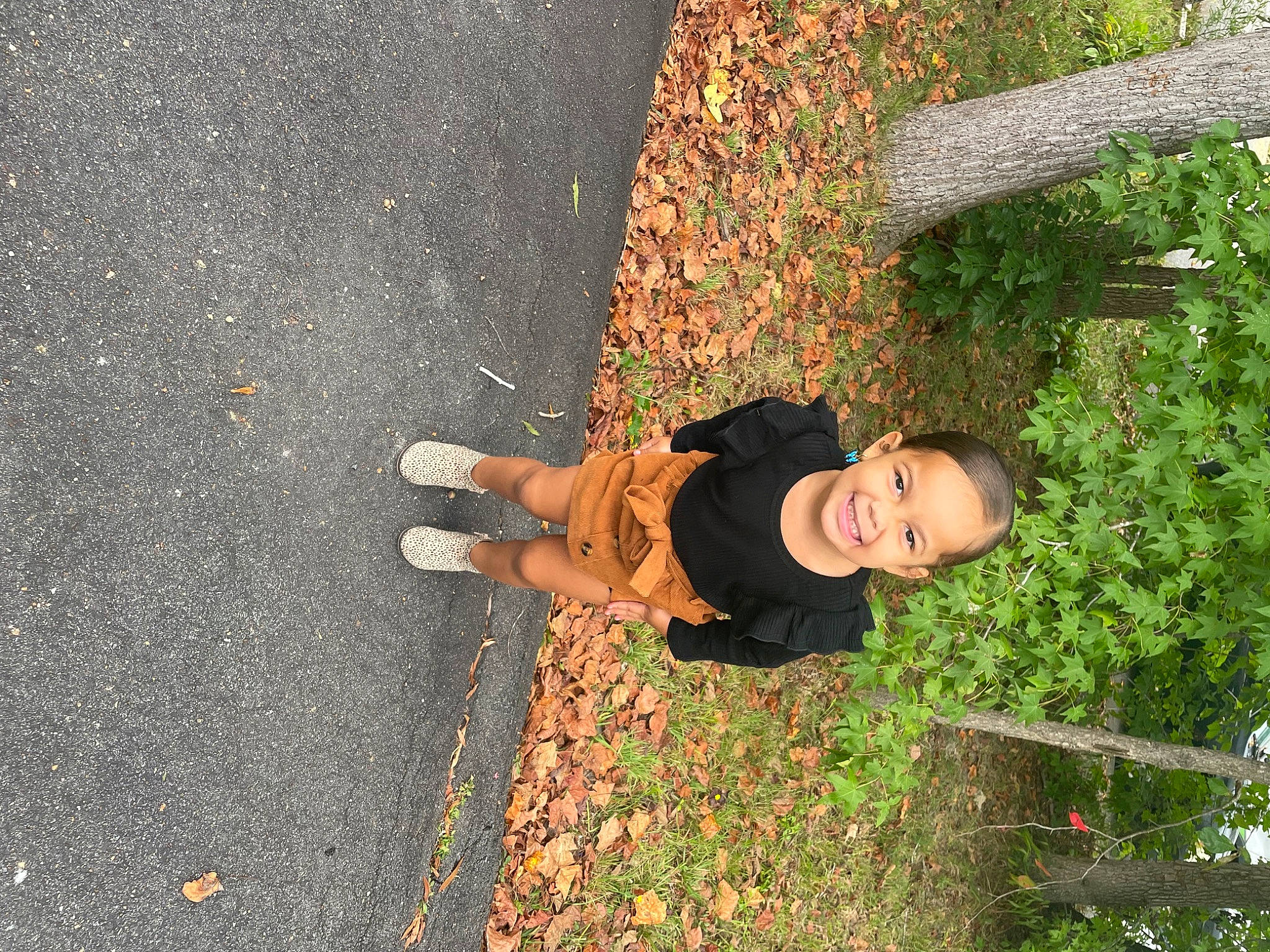 Elani joined the competition — help win amazing prizes! asphalt, child, concrete, fun, grass, human_leg, joy, leisure, people_in_nature, person, plant, road, road_surface, shadow, shrub, sidewalk, smile, soil, t_shirt, tar