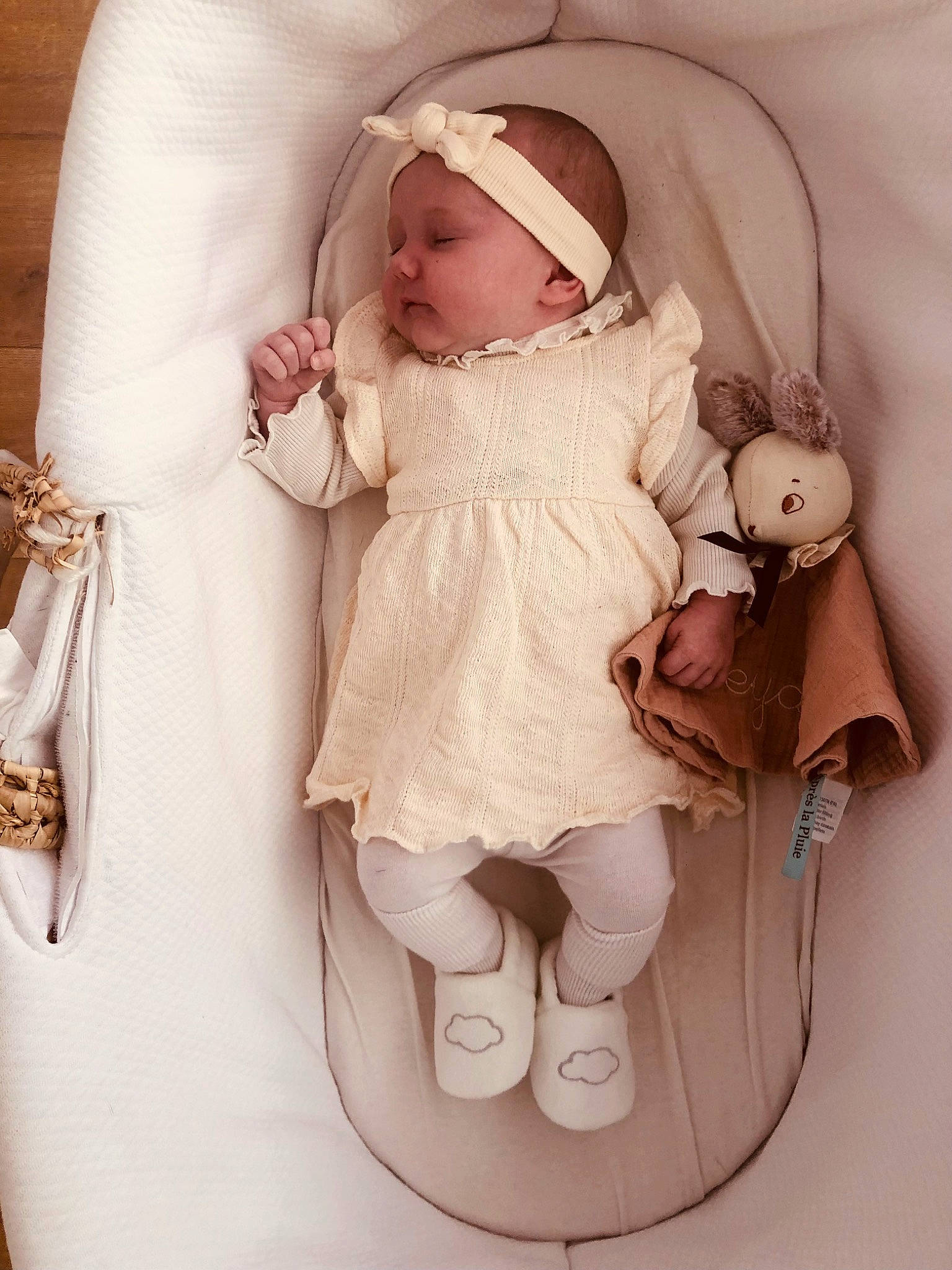 Leya participe au concours pour gagner de l'argent avec cette photo : arm, baby, baby_products, baby_sleeping, baby_toddler_clothing, comfort, eye, face, finger, hand, head, headgear, headwear, human_body, leg, person, pink, sitting, skin, sleeve