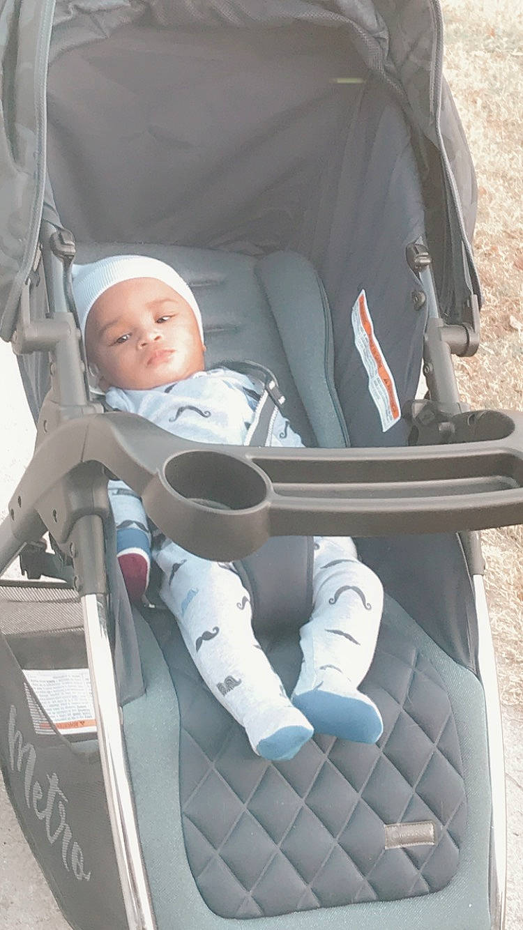 Sekani joined the competition — help win amazing prizes! auto_part, baby, baby_carriage, baby_products, baby_safety, baby_toddler_clothing, car_seat, carmine, child, comfort, headwear, person, product, service, sitting, toddler
