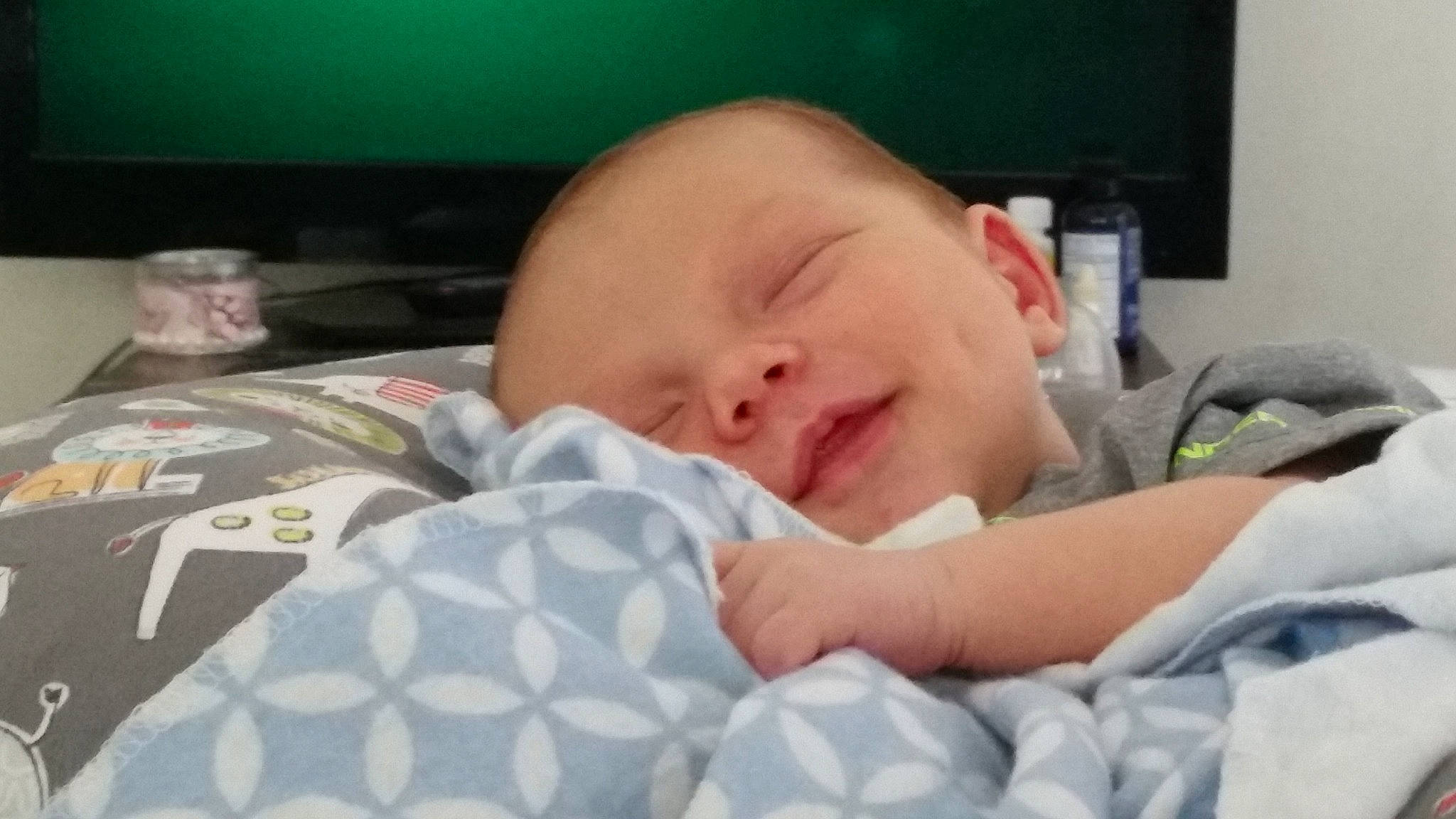 Malikai is registered to the contest to win money with this photo: baby, baby_sleeping, bedtime, birth, cheek, child, comfort, ear, eye, face, finger, hand, head, mouth, nap, nose, person, skin, sleep, textile