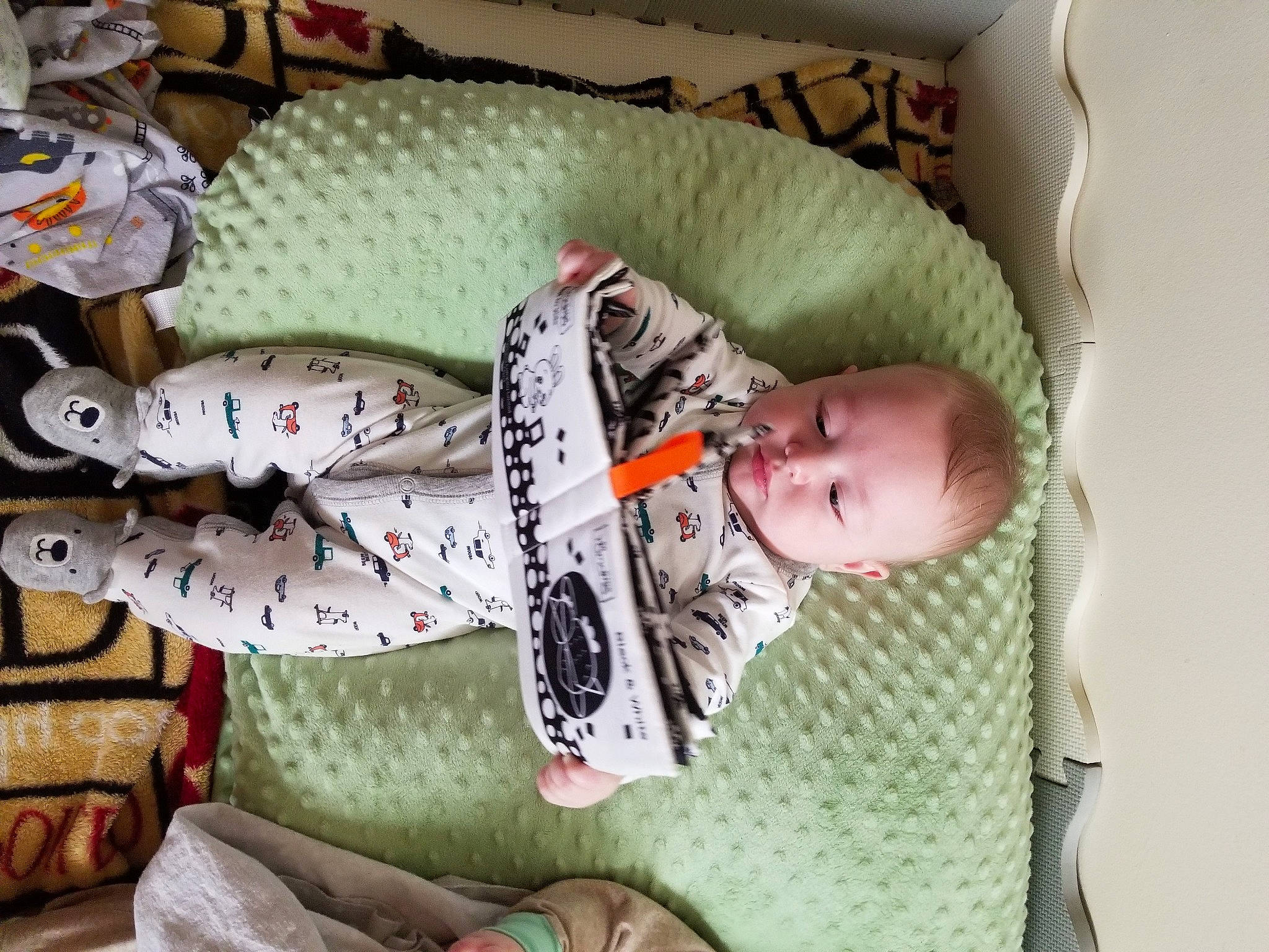 Joseph is registered to the contest to win money with this photo: baby, baby_products, baby_safety, baby_sleeping, baby_toddler_clothing, bedtime, comfort, foot, human, infant_bed, linens, nightwear, nose, person, plush, product, sleep, stuffed_toy, toddler