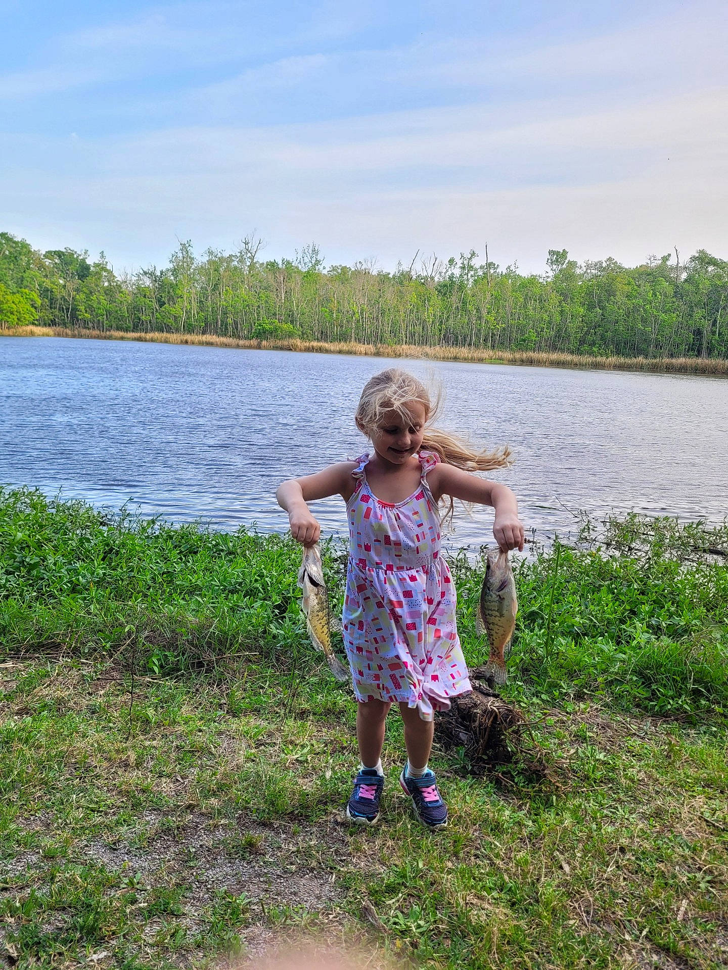 Caroline joined the competition — help win amazing prizes! cloud, fun, grass, grass_family, grassland, happy, horizon, joy, lake, leisure, meadow, natural_landscape, people_in_nature, person, plant, recreation, sky, spring, summer, toddler