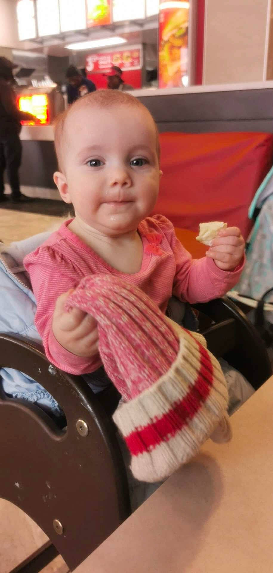 Mélodie participe au concours pour gagner de l'argent avec cette photo : baby, baby_products, baby_toddler_clothing, cheek, child, chin, comfort, finger, fun, gesture, happy, lap, peach, person, room, sitting, skin, sleeve, thumb, toddler