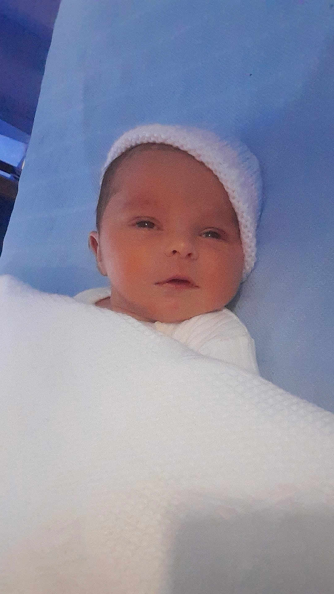 Deeana-Denise is registered to the contest to win money with this photo: baby, newborn, blanket, hat, sleeping, face, infant, cozy, resting, soft, cute, child, portrait, indoors, warm, knitted, peaceful, wrapped, young, lying_down