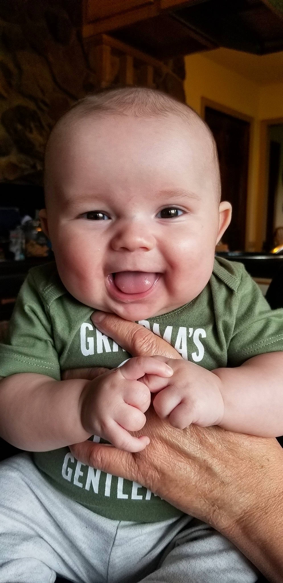 Keaton is registered to the contest to win money with this photo: baby, baby_making_funny_faces, cheek, child, chin, face, facial_expression, finger, forehead, hand, head, laugh, lip, mouth, nose, person, skin, smile, thumb, toddler