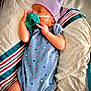 Ali is registered to the contest to win money with this photo: arm, baby, baby_sleeping, baby_toddler_clothing, child, comfort, electric_blue, finger, hand, human_body, joint, linens, nail, neck, pattern, pink, skin, sleeve, thigh, toddler