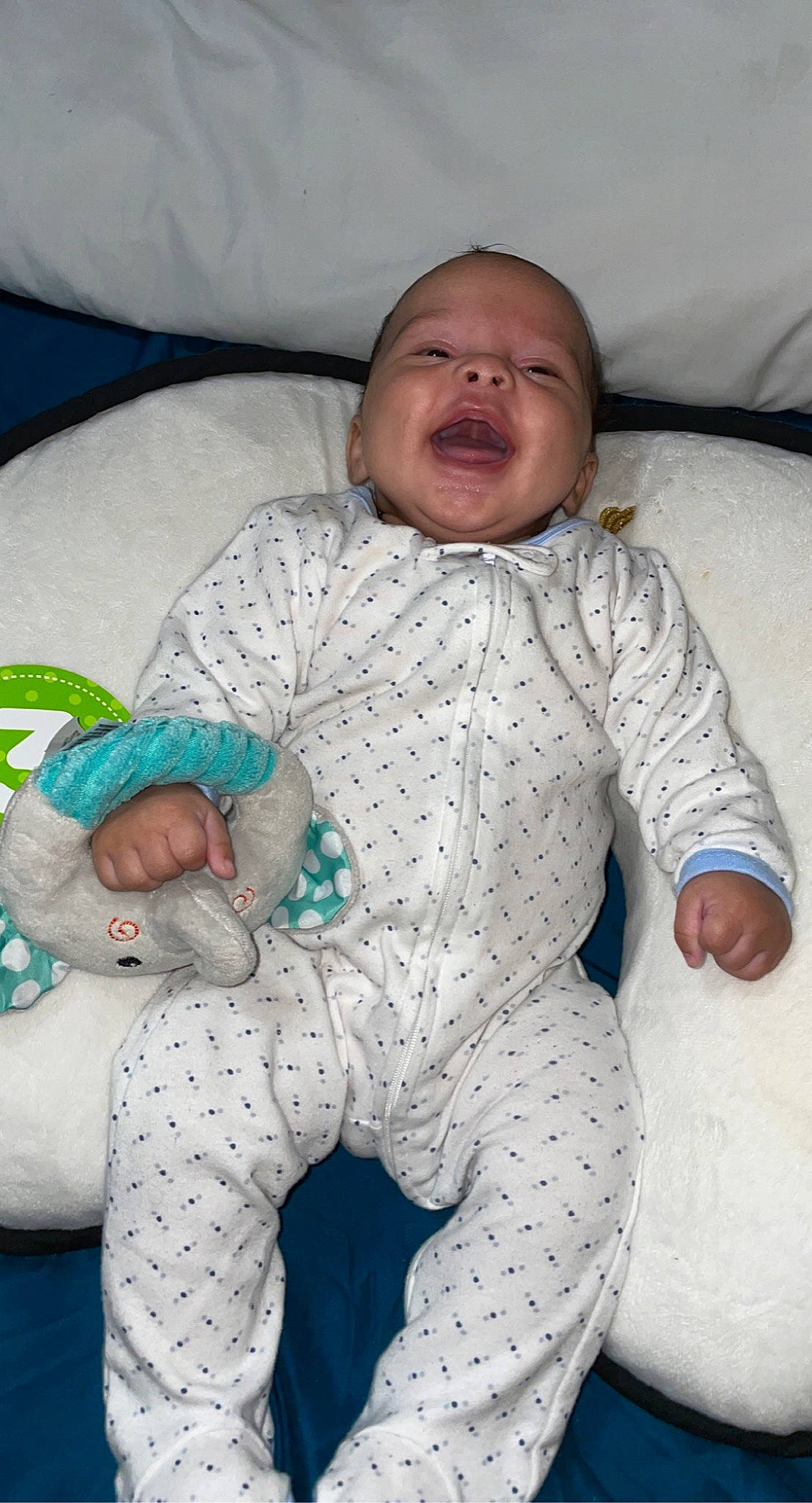 Saiyir joined the competition — help win amazing prizes! baby, baby_products, baby_safety, baby_sleeping, baby_toddler_clothing, child, comfort, couch, lap, linens, pattern, person, room, sitting, skin, smile, textile, toddler, white