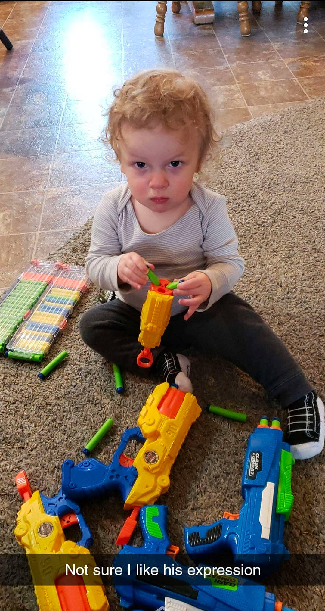 Maddox is registered to the contest to win money with this photo: baby, baby_playing_with_toys, blue, child, construction_set_toy, educational_toy, flooring, fun, interlocking_block, leisure, person, play, sharing, sitting, tire, toddler, toy, toy_block, vehicle, wheel