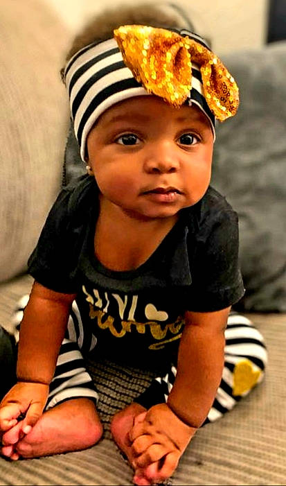 Ashanti joined the competition — help win amazing prizes! baby, baby_toddler_clothing, beanie, cap, cheek, child, child_model, cool, ear, fashion_accessory, hat, headgear, headwear, person, smile, toddler, yellow