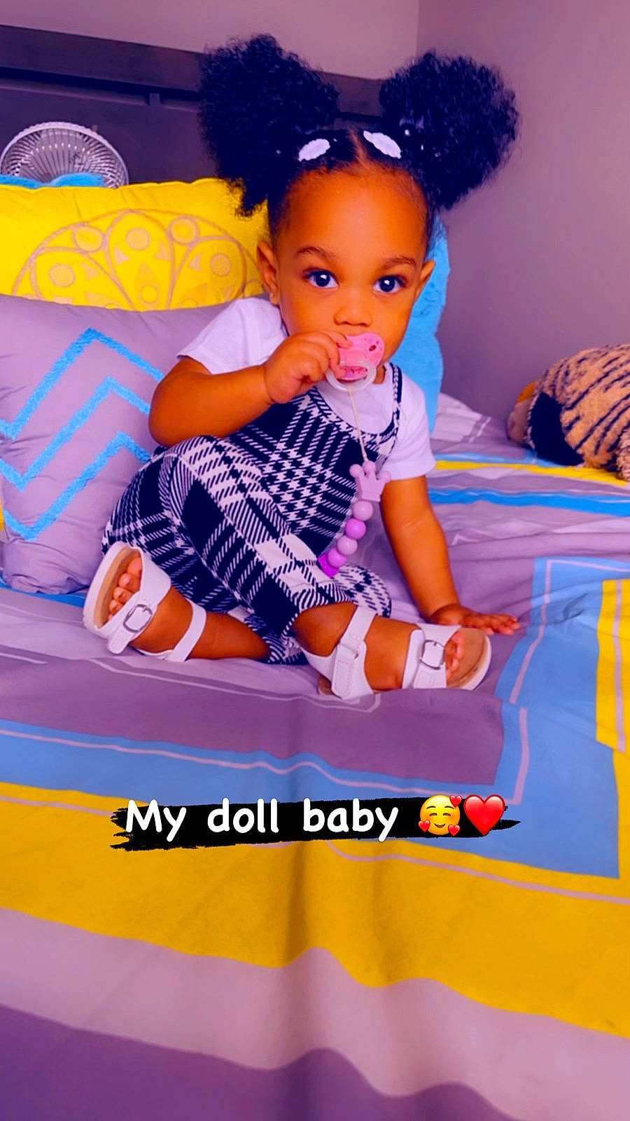 Ahmoriyah is registered to the contest to win money with this photo: advertising, afro, barbie, child, doll, electric_blue, font, fun, happy, leisure, magenta, orange, pattern, person, pink, play, purple, sitting, toddler, toy