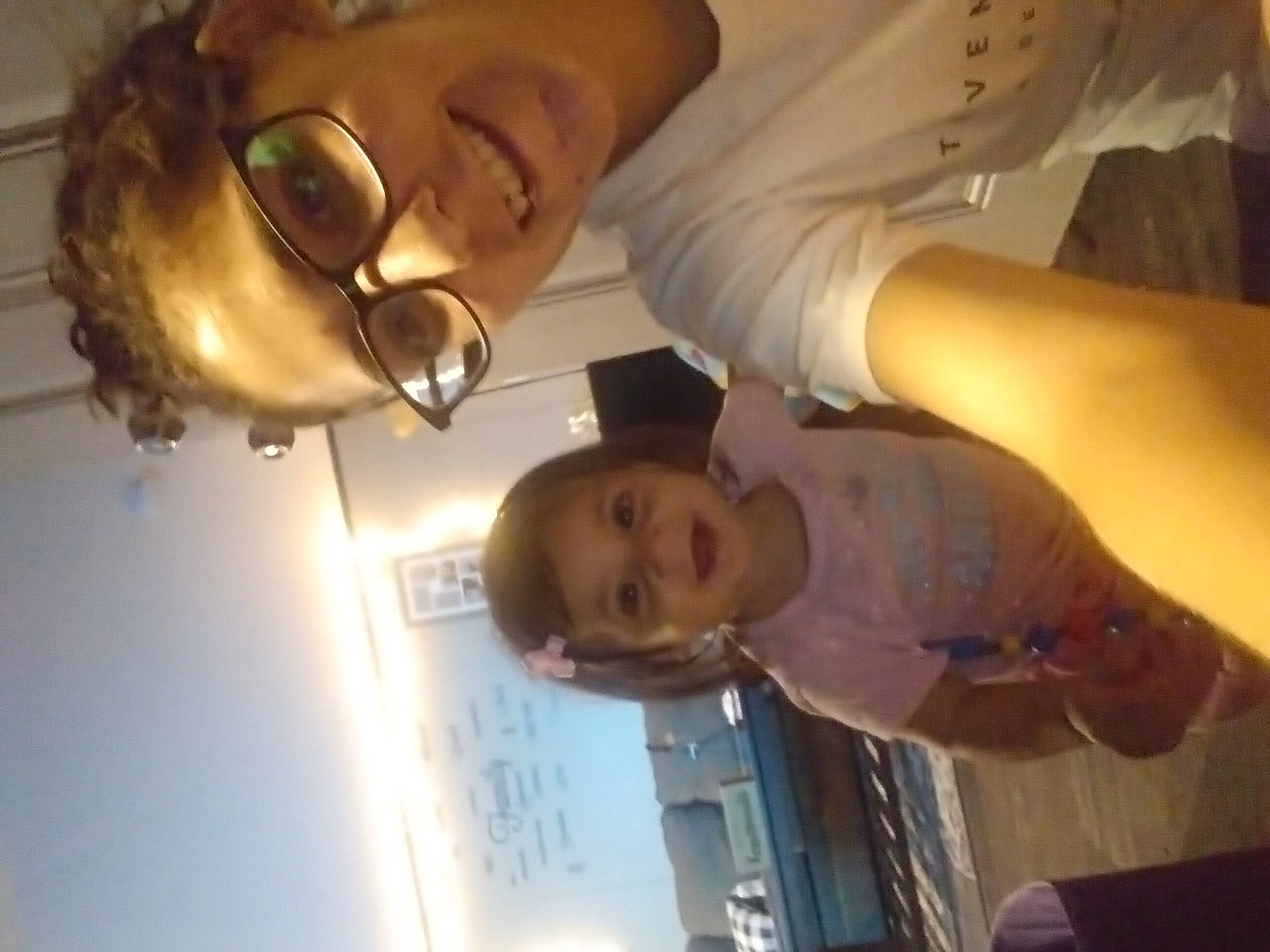 Renesmae is registered to the contest to win money with this photo: child, chin, ear, event, eyebrow, eyelash, eyewear, forehead, fun, gesture, happy, hat, jaw, joy, mouth, nose, organ, person, skin, smile