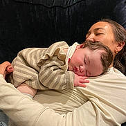 Quinn joined the competition — help win amazing prizes! baby, woman, sleeping, couch, cozy, striped_clothing, arm, resting, indoor, comfort, child, love, family, portrait, relaxation, skin, hand, head, clothing, peaceful