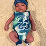 baby, infant, child, jersey, jordan, number_23, headband, socks, blanket, faux_fur, portrait, lying_down, hands, legs, face, hair, sportswear, blue, white, cute