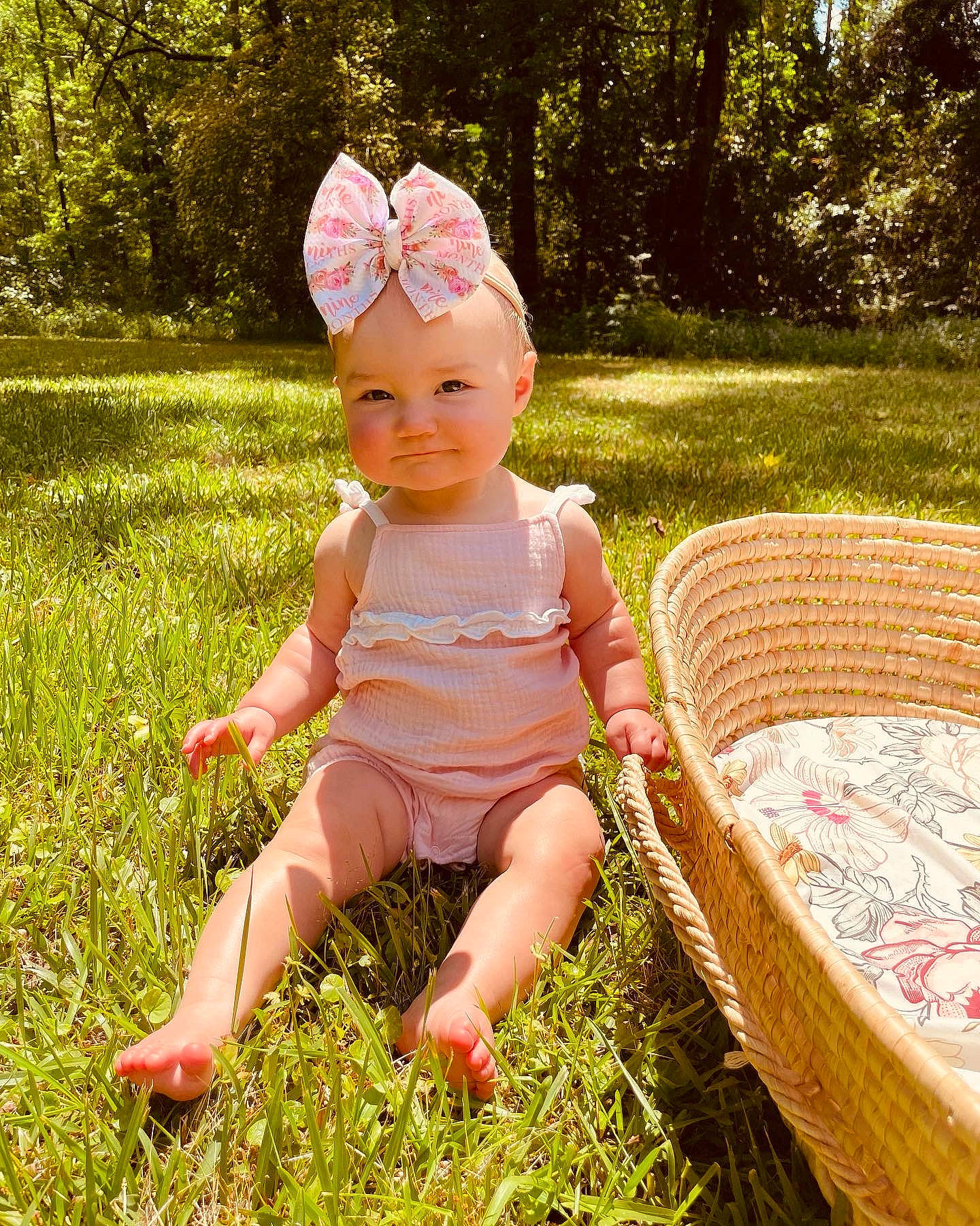 Molly Grace is registered to the contest to win money with this photo: baby, baby_toddler_clothing, cap, child, costume_hat, fun, garden, grass, grass_family, happy, headband, headpiece, headwear, lawn, outdoor_furniture, people_in_nature, person, pink, plant, sunlight