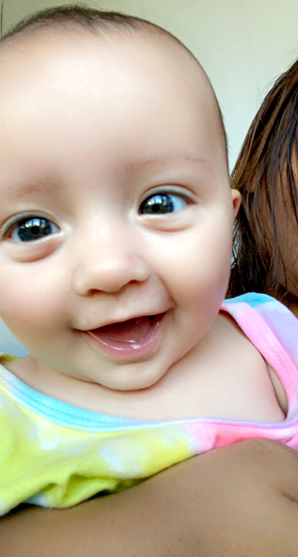 Lauren is registered to the contest to win money with this photo: baby, baby_toddler_clothing, cheek, child, chin, eye, eyebrow, eyelash, face, facial_expression, fun, grass, happy, iris, lip, mouth, nose, person, skin, smile