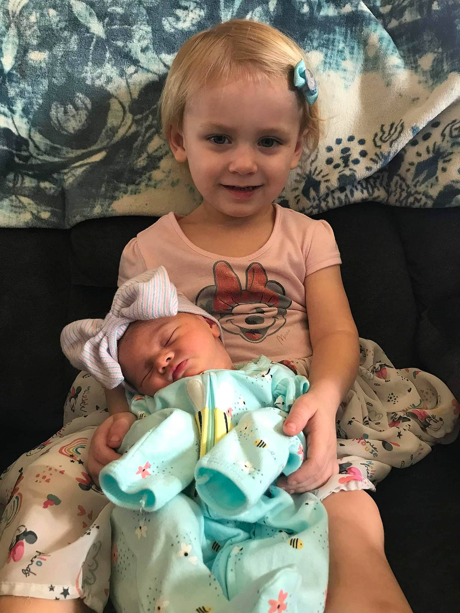 Ciara is registered to the contest to win money with this photo: baby, baby_toddler_clothing, cheek, child, comfort, eye, face, facial_expression, finger, fun, happy, head, headwear, human_body, joy, mammal, mouth, person, skin, sleeve