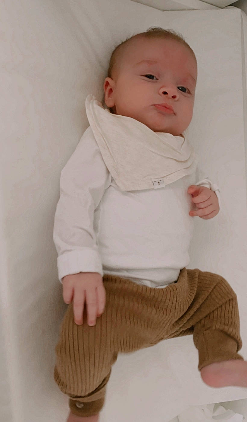 Gigi is registered to the contest to win money with this photo: baby, baby_products, baby_toddler_clothing, cheek, child, collar, comfort, fur, linens, lip, neck, outerwear, pattern, person, product, sitting, skin, sleeve, textile, toddler