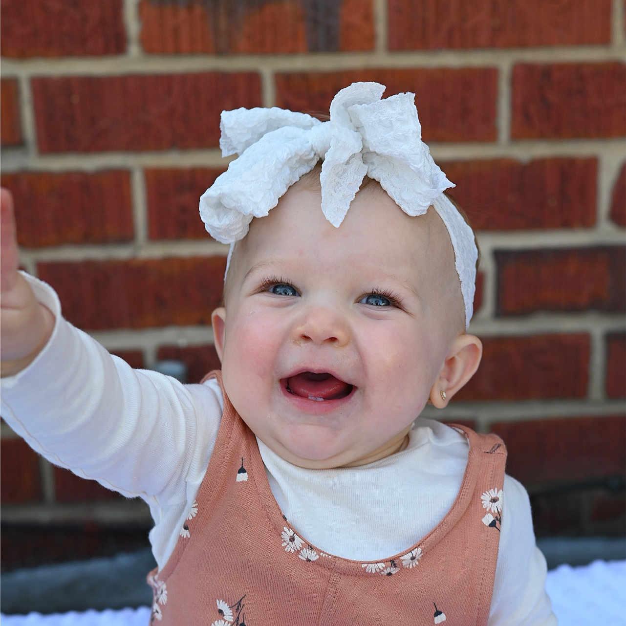 Avery joined the competition — help win amazing prizes! accessories, applique, baby, bodypart, bonnet, brick, clothing, dress, face, finger, hand, happy, hat, head, headband, pattern, person, photography, portrait, smile