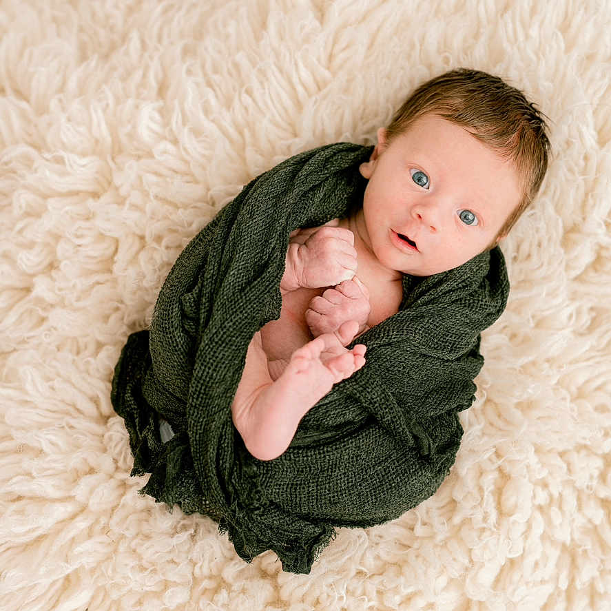 Miller joined the competition — help win amazing prizes! baby, blanket, bodypart, bonnet, clothing, face, finger, hand, happy, hat, head, knitwear, longsleeve, newborn, person, photography, portrait, sleeve, smile, sweater