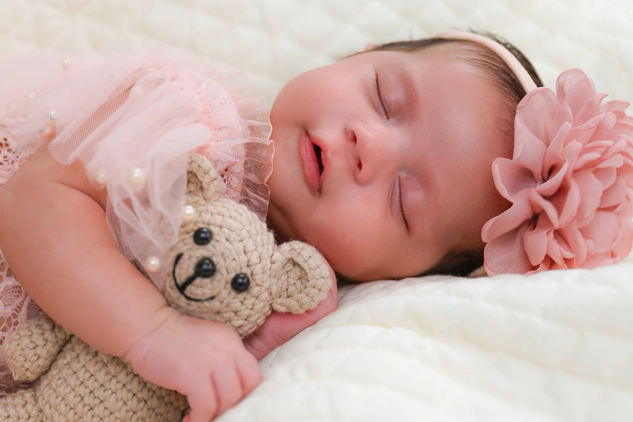 Alessandra is registered to the contest to win money with this photo: baby, baby_sleeping, baby_toddler_clothing, cheek, comfort, eye, eyelash, finger, flower, hand, head, headgear, headwear, iris, lip, mouth, nose, person, pink, skin